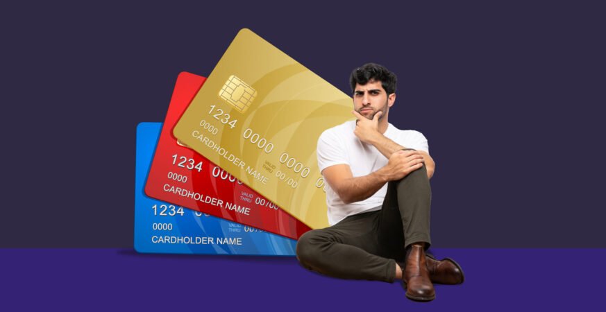 Confused man thinking about having multiple credit cards
