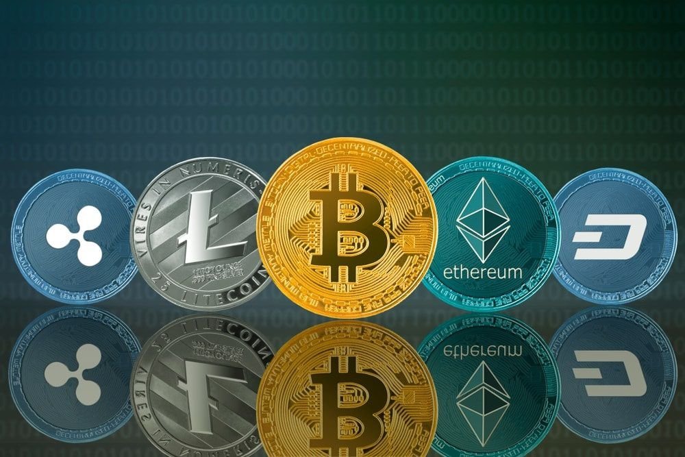 A lineup of popular cryptocurrencies including Ripple (XRP), Litecoin (LTC), Bitcoin (BTC), Ethereum (ETH), and Dash (DASH), displayed as shiny coins with a digital binary background.